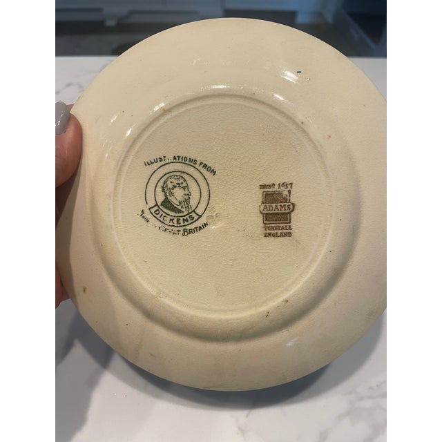 A charming vintage earthenware decorative plate by the historic pottery maker Adams of England, dating from the mid-20th...