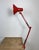 Vintage red adjustable table lamp made in Italy during the 1970. Adjustable in all desired positions. It features an...