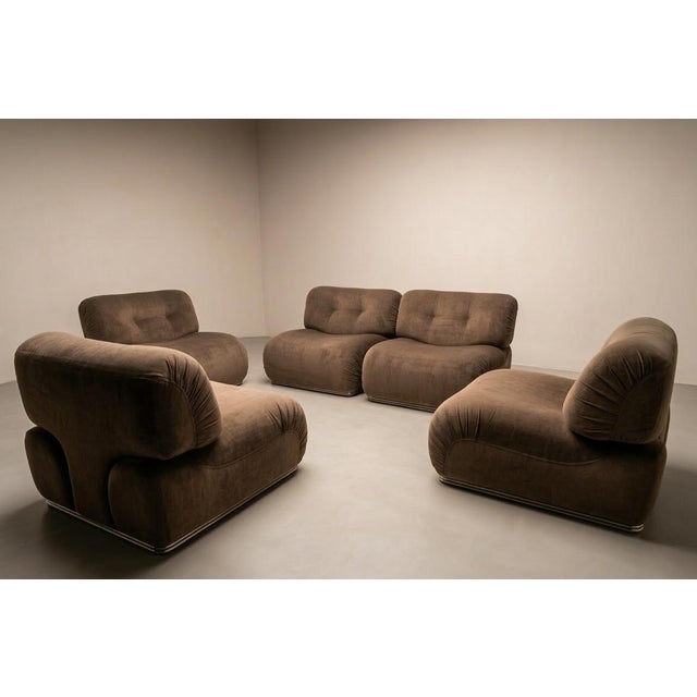 Condition: Good with minor signs of wear and tear. They have recently been reupholstered. Design & Style These armchairs...