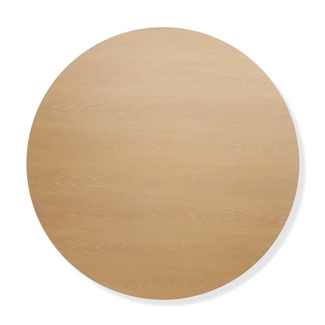 Our Haven Dining Table, now available with a 72" top, is finished in cerused oak. The pedestal base is reeded and...