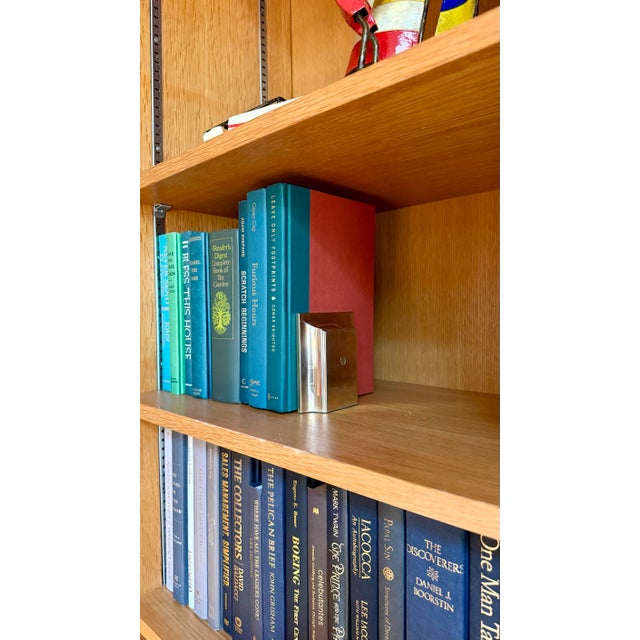 We are very pleased to offer this striking pair of vintage 23-karat gold-plated bookends by El Casco, circa 1970s. Founded...