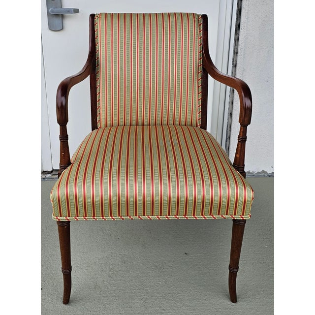Hickory Chair Co. Regency Mahogany and Upholstered Armchair Measures 24" in width x 26" in depth x 34.5" in height. Seat...