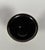 A monochrome black porcelain footed bowl, early 18th century. Thick, deep black glaze known as "black mirror." The bowl-...