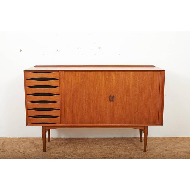 Model OS63 Highboard in Teak and Black Painted Recessed Handles by Arne Vodder for Sibast, 1958, in Good conditions....