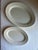 Vintage ironstone platters, large JHM marked on reverse and small Buffalo China. Small measures 12.5 x 8.5 x 1. Large 16 x...