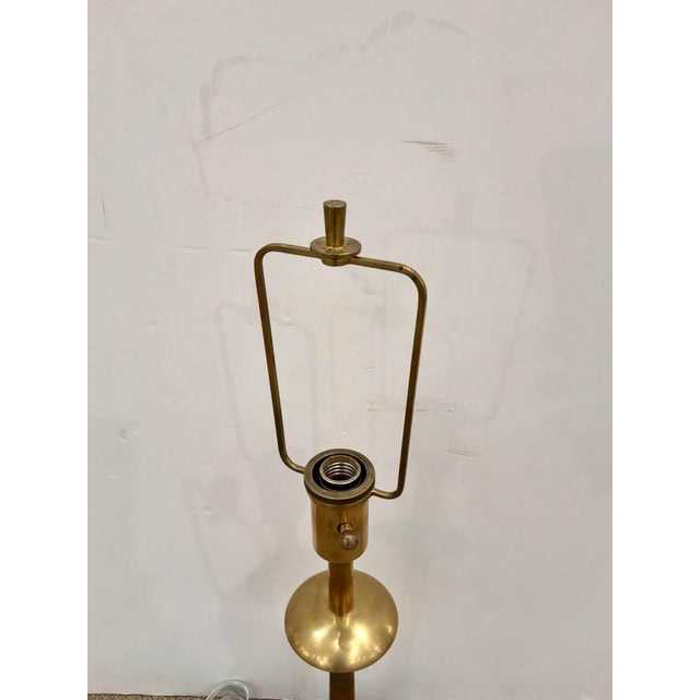 Stylish Barbara Barry Candlestick Lamp, aged brass finish on round base. Showroom Floor sample.