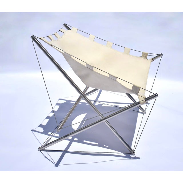 "Galaxie" chair in natural canvas, steel, and aluminum, designed in 1969 by architect and designer Jacques Henri Varichon,...