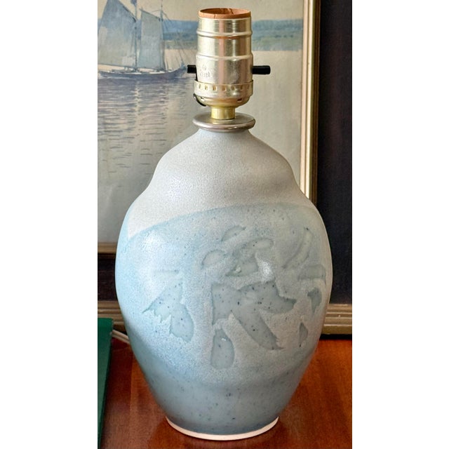 Beautiful 1980s studio pottery vase turned lamp by American artisan, Nancy Bishop. In coastal colors of light blue and...