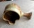 This vintage stoneware brown piece is uniquely designed with a side pour lip and a handle. As such, it may be used as a...