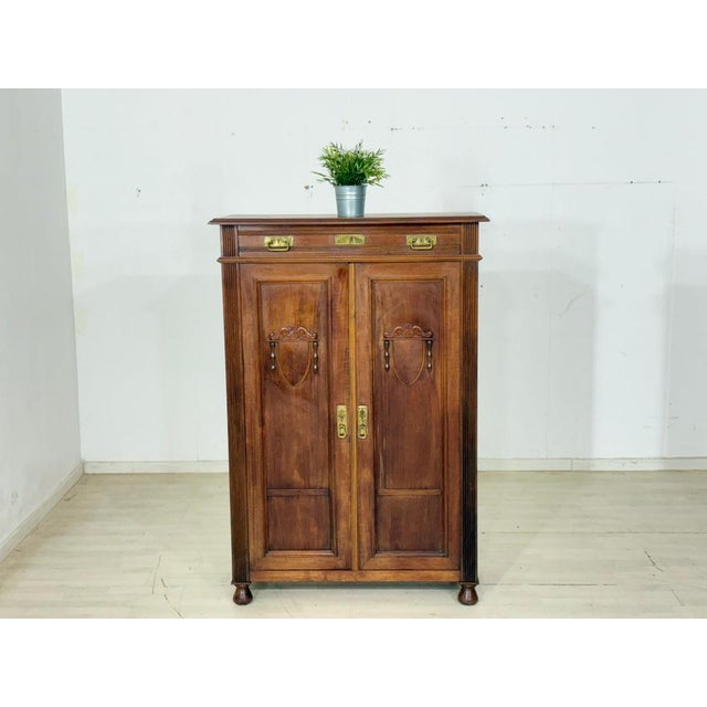 Very beautiful vertiko from the Gründerzeit period, circa 1900. This piece of furniture impresses with its elegant,...