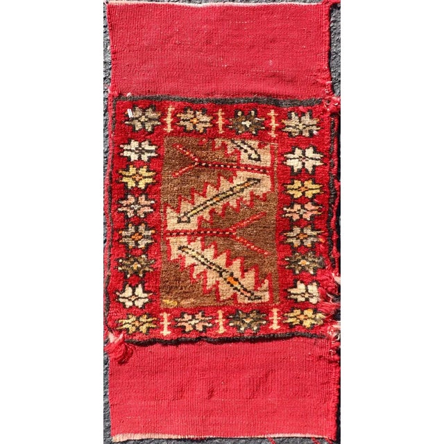 This item includes a pair (two) of Turkish rugs rendered in colors of coral, yellow and brown. There is some wear on the...