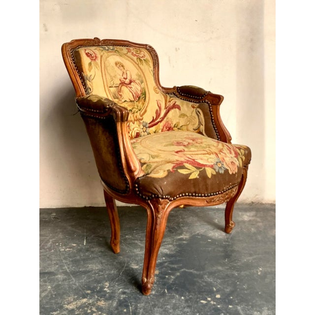 This distinguished armchair beautifully captures the grace and romantic ornamentation of the French Provincial style....