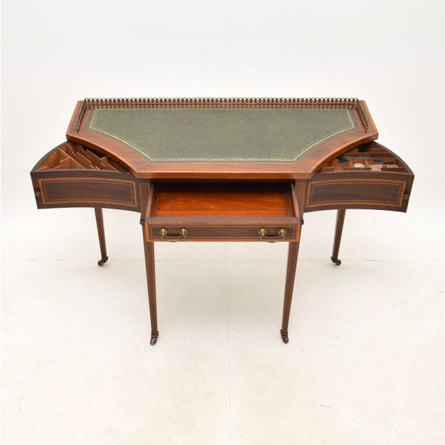 A wonderful antique Edwardian writing table / desk. This was made in England, it dates from the 1900-1910 period. It has a...