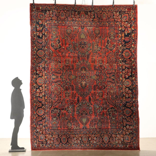 American Saruk rug in cotton and wool, large knot, hand made. This piece is attributed to the mentioned designer/maker. It...