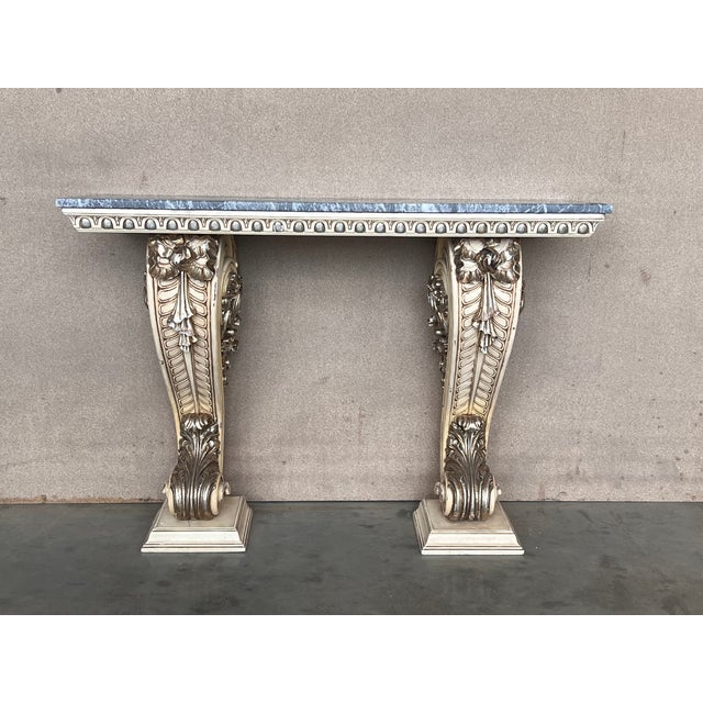 Dramatic Hollywood Regency Palm Leaf console lacquered in eye catching almond latte lacquer with a beveled edge marble...