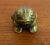 Cute miniature ceramic frog. Tuck in your favorite plant or add to your bookshelf. Please see condition details noted....