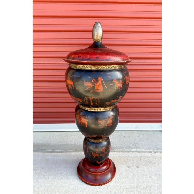 Beautiful hand painted wood urn storage container with lid. Made in India Birds and animals throughout the print....