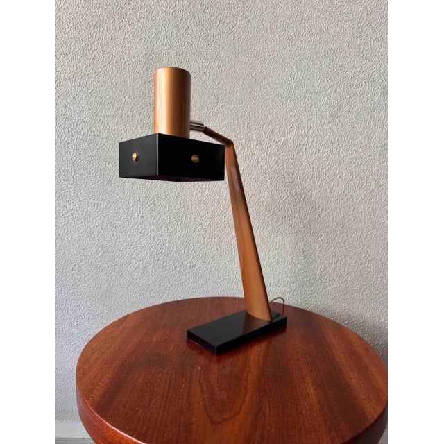 The Geisha Table Lamp in the gold version, designed by Luis Pérez de la Oliva for Fase Madrid in 1967, is a refined...