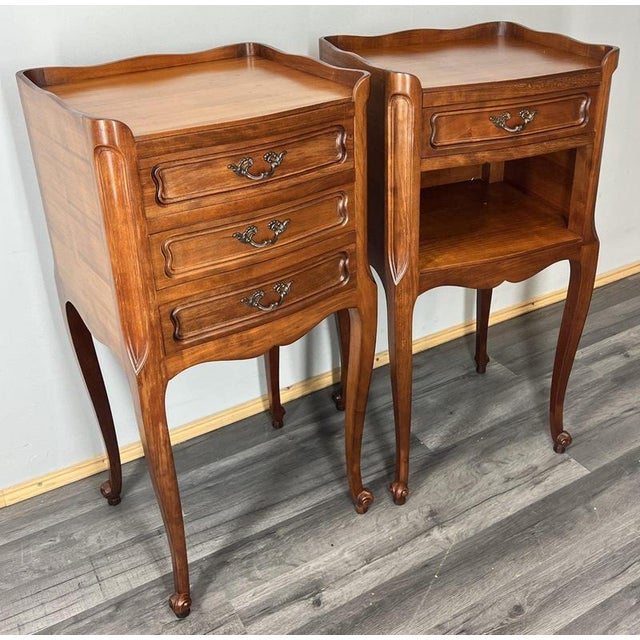 A beautiful pair of vintage French Louis-style bedside tables , finely crafted with graceful curves and delicate...
