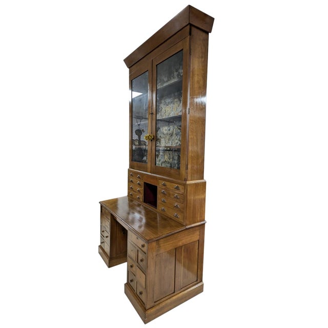 Antique, Bookcase Desk, Top has 2 glass front doors, 3 Shelves, 8 Small hand cut dovetailed small drawers, Bottom has...