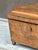 This sarcophagus shaped tea caddy is a good example of fine craftsmanship. The box is made of beautiful figured rosewood...