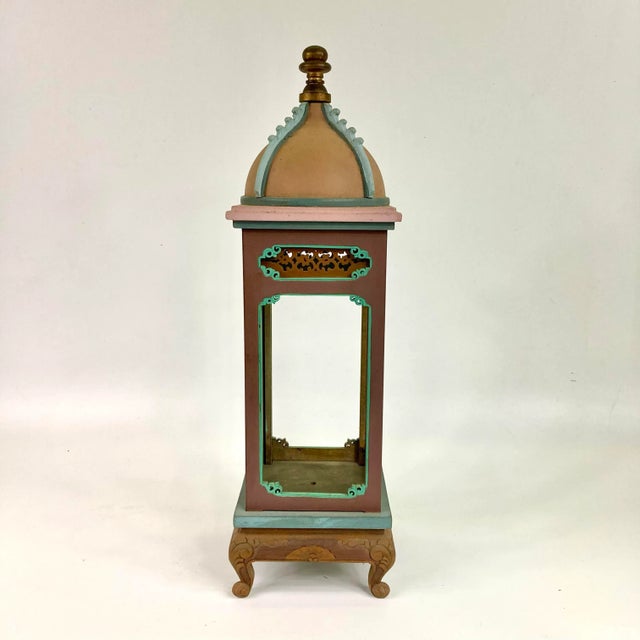 A beautifully handcrafted gazebo with teal accents