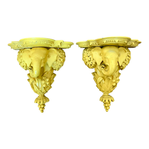 1970s Carved Wood Yellow Lacquer Elephant Wall brackets.A Pair