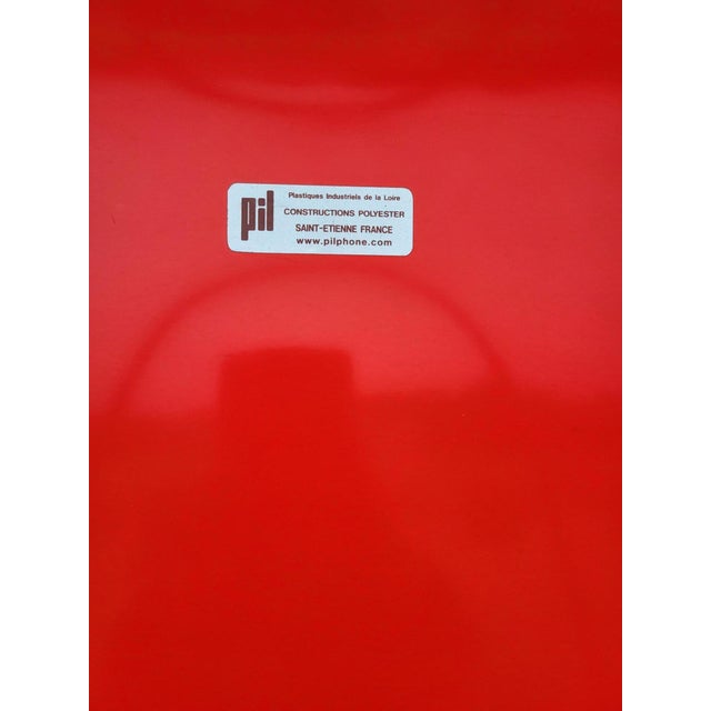 This freestanding telephone booth is a creation of the French brand Pil (Plastiques Industriels de la Loire)....