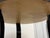 Design Plus Gallery presents a Art Deco Macassar Ebony Side Table. This round side table showcases a high gloss lacquered...