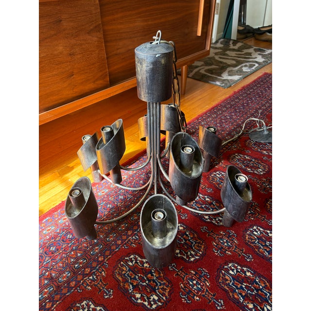 Rare and beautiful brutalist mid 60s designed and produced Marcello Fantoni Italian chandelier. 20” tall by 24” diameter...
