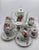 This large, festive set by Johann Seltmann impresses with a total of 18 pieces: 7 cups, 7 saucers, an elegant teapot,...