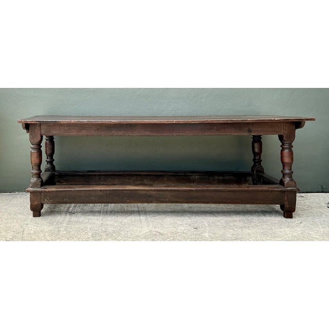 A commanding example of Belgian farmhouse design, this vintage monumental dining table embodies the enduring beauty of...