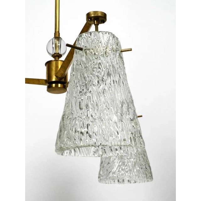 Beautiful heavy mid century modern ceiling lamp by rupert nikoll. Made in vienna austria. three high-quality cone-shaped...