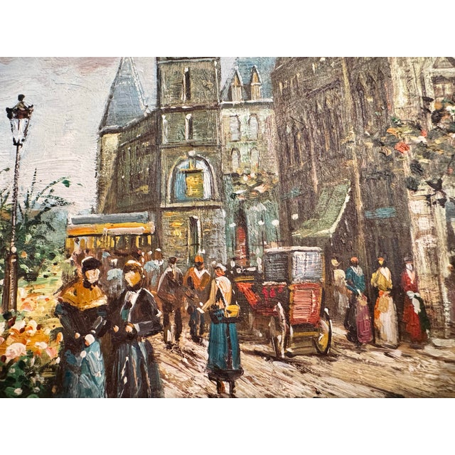 The vintage framed oil painting, depicts a European city scene in Paris. This oil on canvas depicts 19th century street...