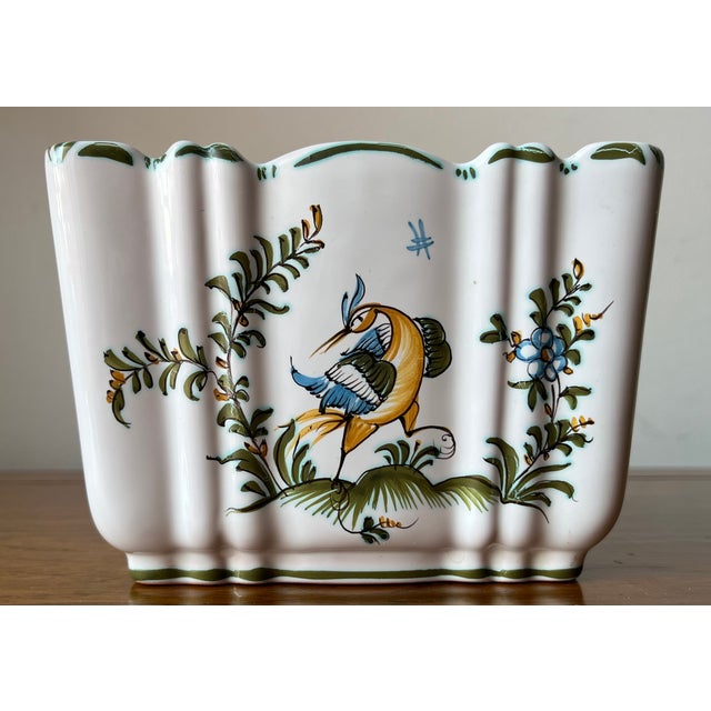 This lovely French faience hand-painted tulipiere vase or flower wall pocket features birds and flowers on a White ground...