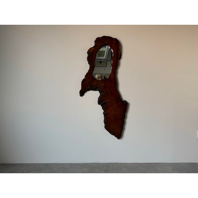 I'm pleased to offer for sale this Magnificent Vintage handmade brutalist burl wood wall mirror. Sculpted in a rough hewn...