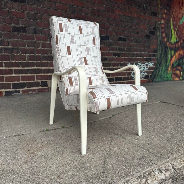 Thonet Tall Back Bentwood Arm Chair The chair has two Bentwood arms that have been painted white and the upholstery is...