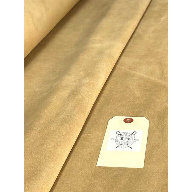 A luxe upholstery suede in a tan color called “paperbag” The double-sided suede is professionally inspected and rolled...