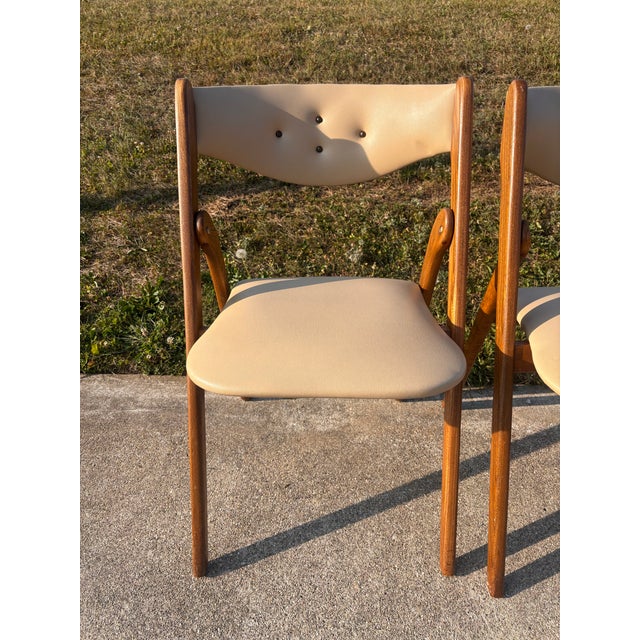 Beautiful and solid Danish mid-century modern wooden folding chairs. Excellent used condition. No rips, tears, missing...