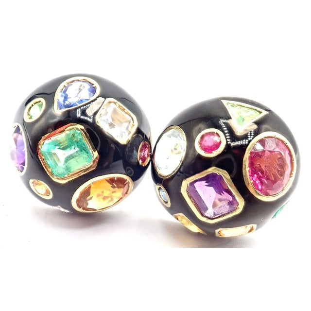 These Verdura Fulco earrings are crafted in 18k yellow gold with glossy black enamel and an artistic mosaic of colorful...