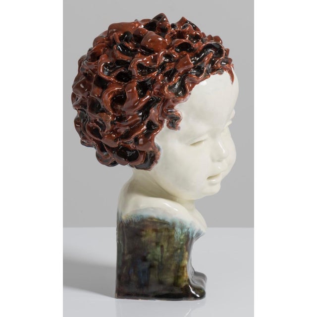 Rare large size child ceramic head sculpture signed and dated by Friedrich Goldscheider on the rear side of the bust....