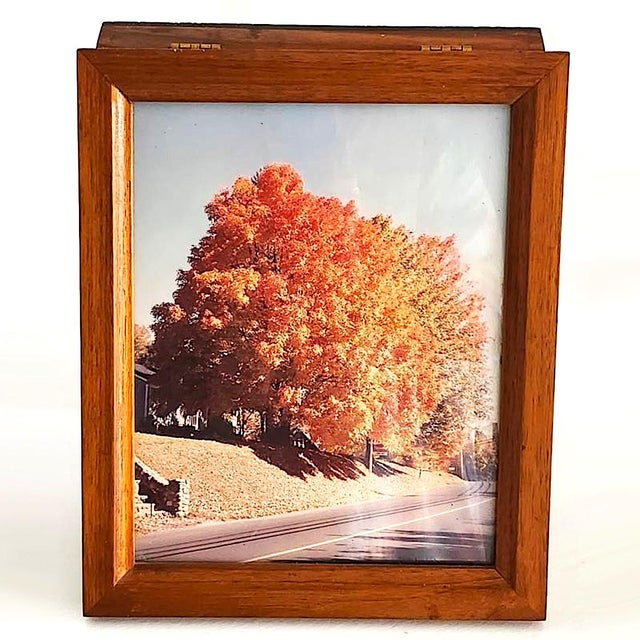 Offered is a vintage wood frame with a fall tree scene picture that lifts to unveil a hidden key box. The picture appears...