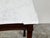 An English mahogany server from the early 19th century, with white veined marble top and lateral drawer. Created in...