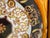 Versace designed large porcelain serving plate. Comes with its matching porcelain serving utensil and its original gold-...
