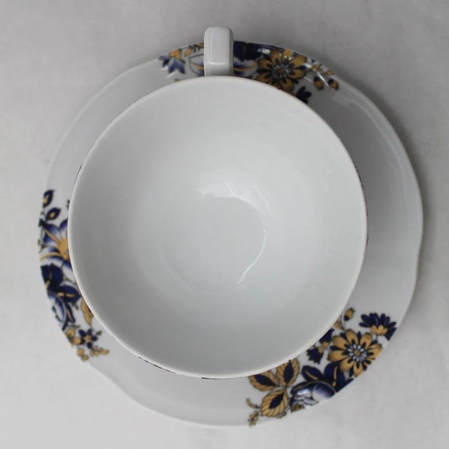 Description: Porcelain tea cup and saucer, set X 2 Collection: Rose Gold & Blue Signed by Maker
