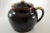 Large round vintage stoneware lidded bean or chili pot casserole crock with a single-handle in deep brown. Perfect in a...