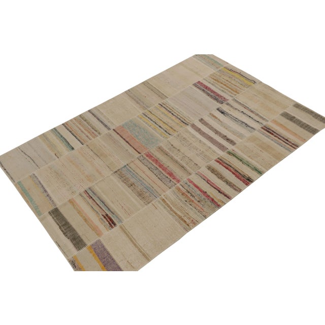 Handwoven in wool, Rug & Kilim presents a 6x9 contemporary rug from their innovative new patchwork kilim collection. On...