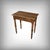 This small walnut writing desk is an elegant piece with timeless charm. Its top reveals magnificent organic grain, a...