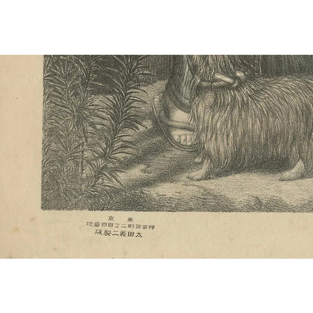 This charming antique lithograph depicts a peaceful domestic scene of a Japanese mother and child, rendered in delicate...