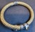 This exquisite vintage cuff bangle bracelet showcases two colors of gold elegant 18 karat solid yellow & White gold. The...